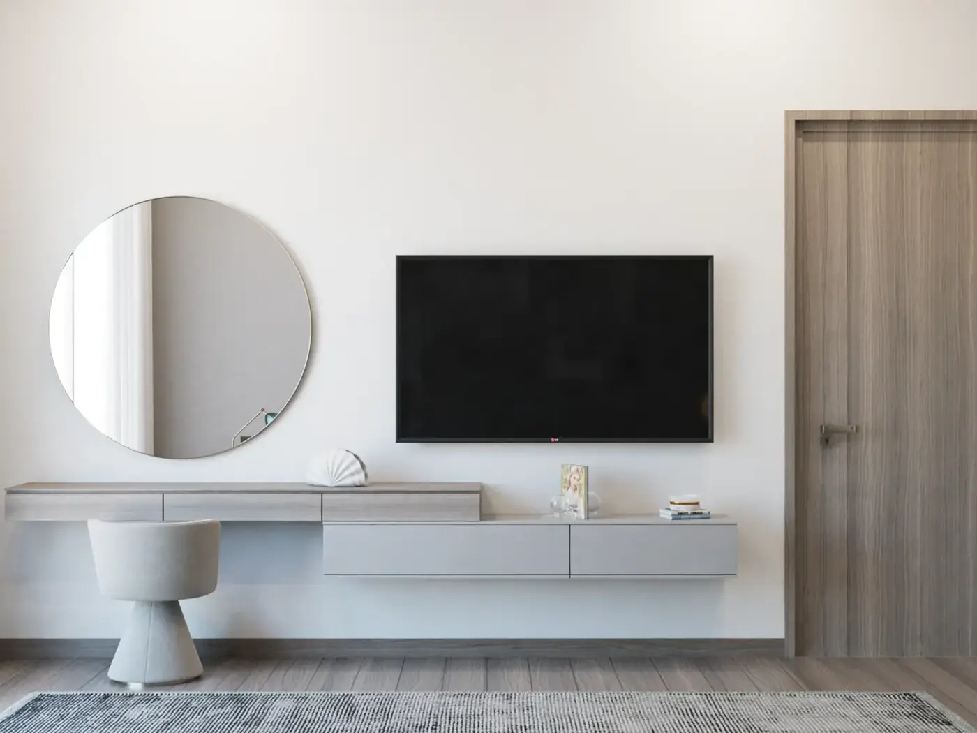 Studio living area with wall-mounted TV unit and vanity, developer render